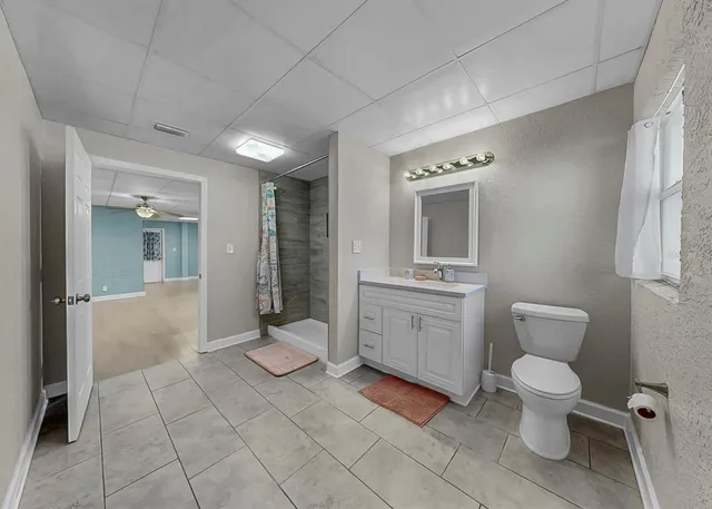 a kitchen with stainless steel appliances granite countertop a sink and a wooden floors