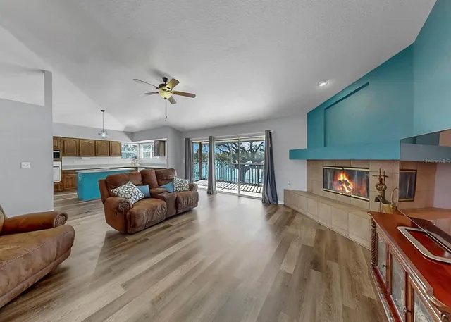 a bathroom with a double vanity sink a mirror and bathtub