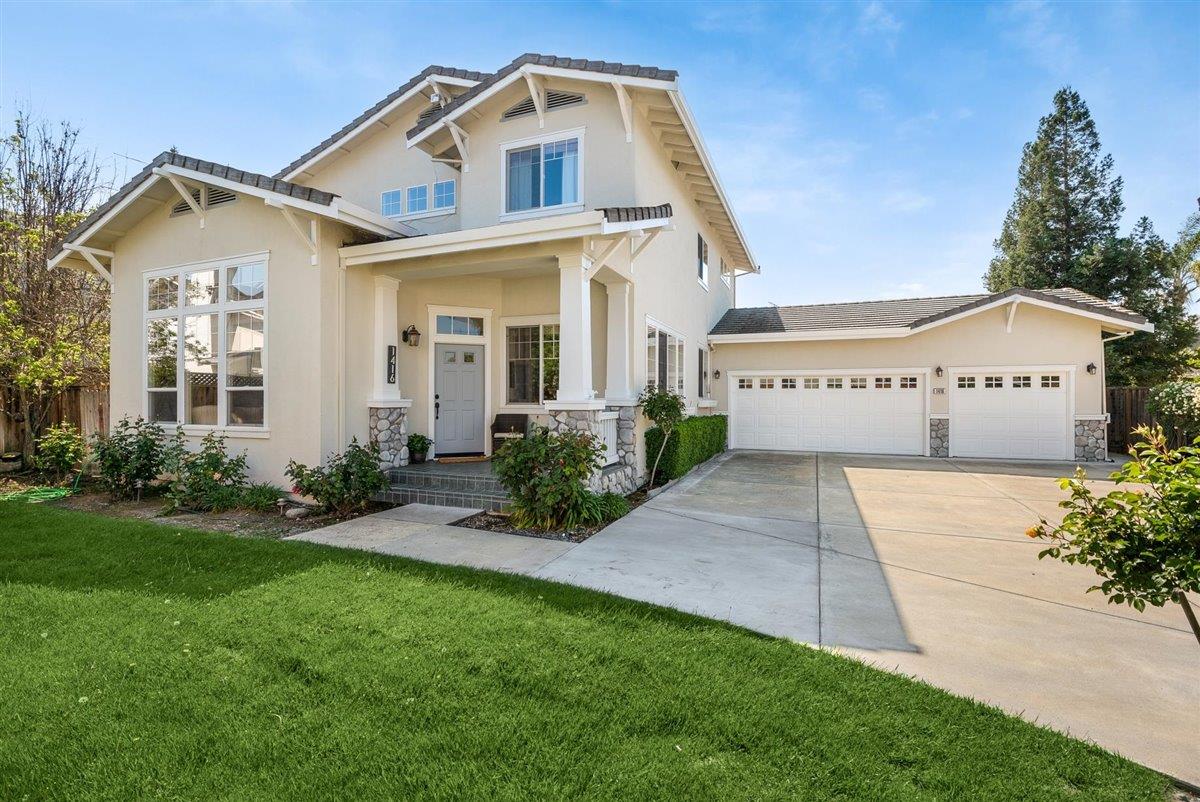 1416 Casablanca Circle Gilroy, CA 95020 - Photo 1 of 32 a front view of a building with garden
