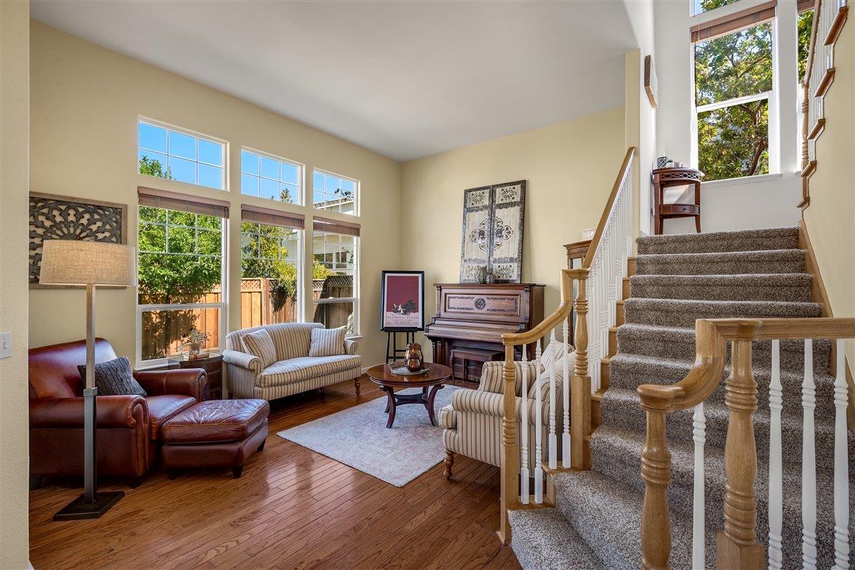 1416 Casablanca Circle Gilroy, CA 95020 - Photo 11 of 32 a living room with furniture and a large window