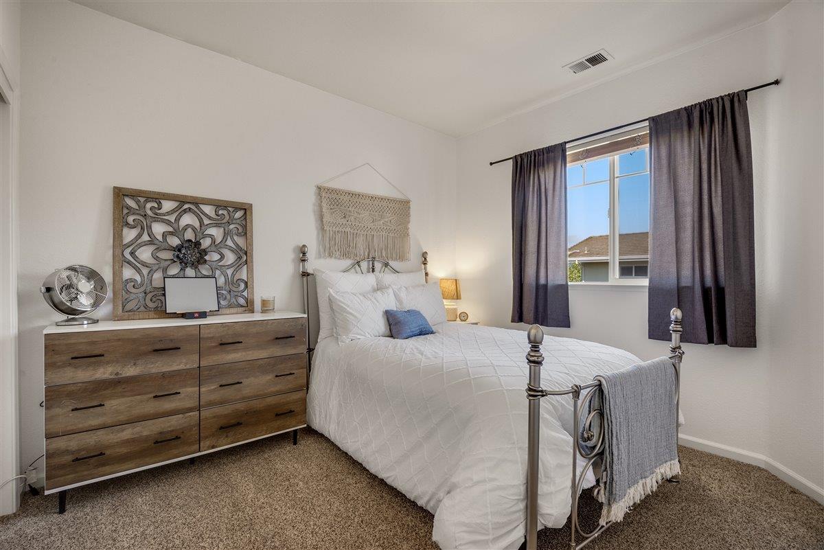 1416 Casablanca Circle Gilroy, CA 95020 - Photo 20 of 32 a bedroom with a bed and a window