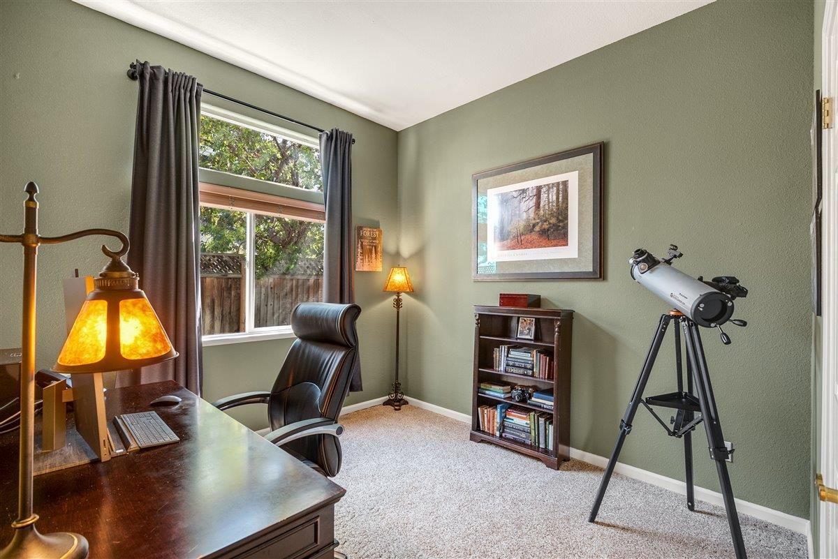 1416 Casablanca Circle Gilroy, CA 95020 - Photo 26 of 32 a view of a workspace with furniture and a window