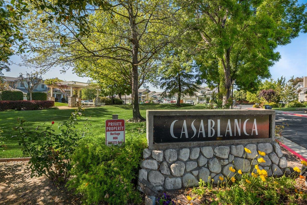 1416 Casablanca Circle Gilroy, CA 95020 - Photo 30 of 32 a view of a sign board with large trees