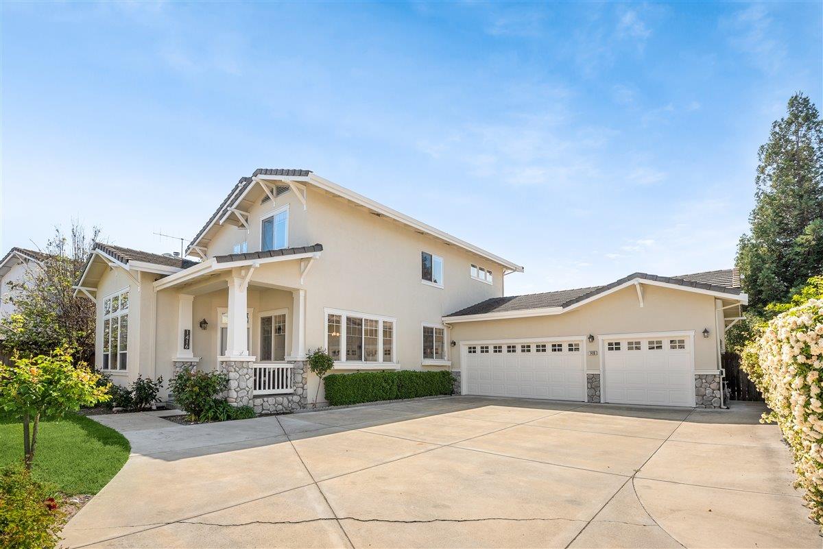 1416 Casablanca Circle Gilroy, CA 95020 - Photo 7 of 32 a view of a house with a yard and potted plants