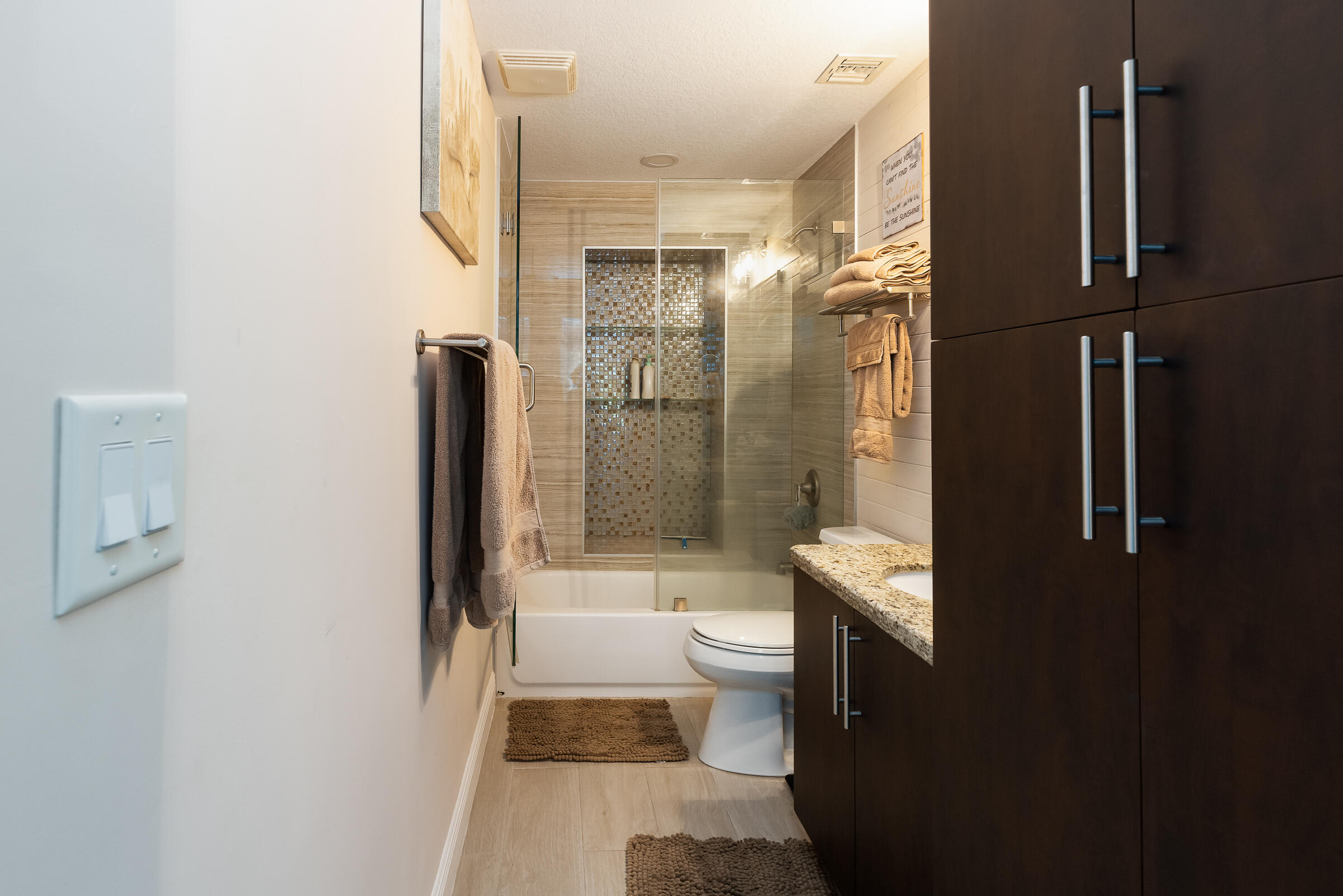 98222 Windward Avenue Key Largo, FL 33037 - Photo 21 of 41 a bathroom with a bathtub shower sink and toilet