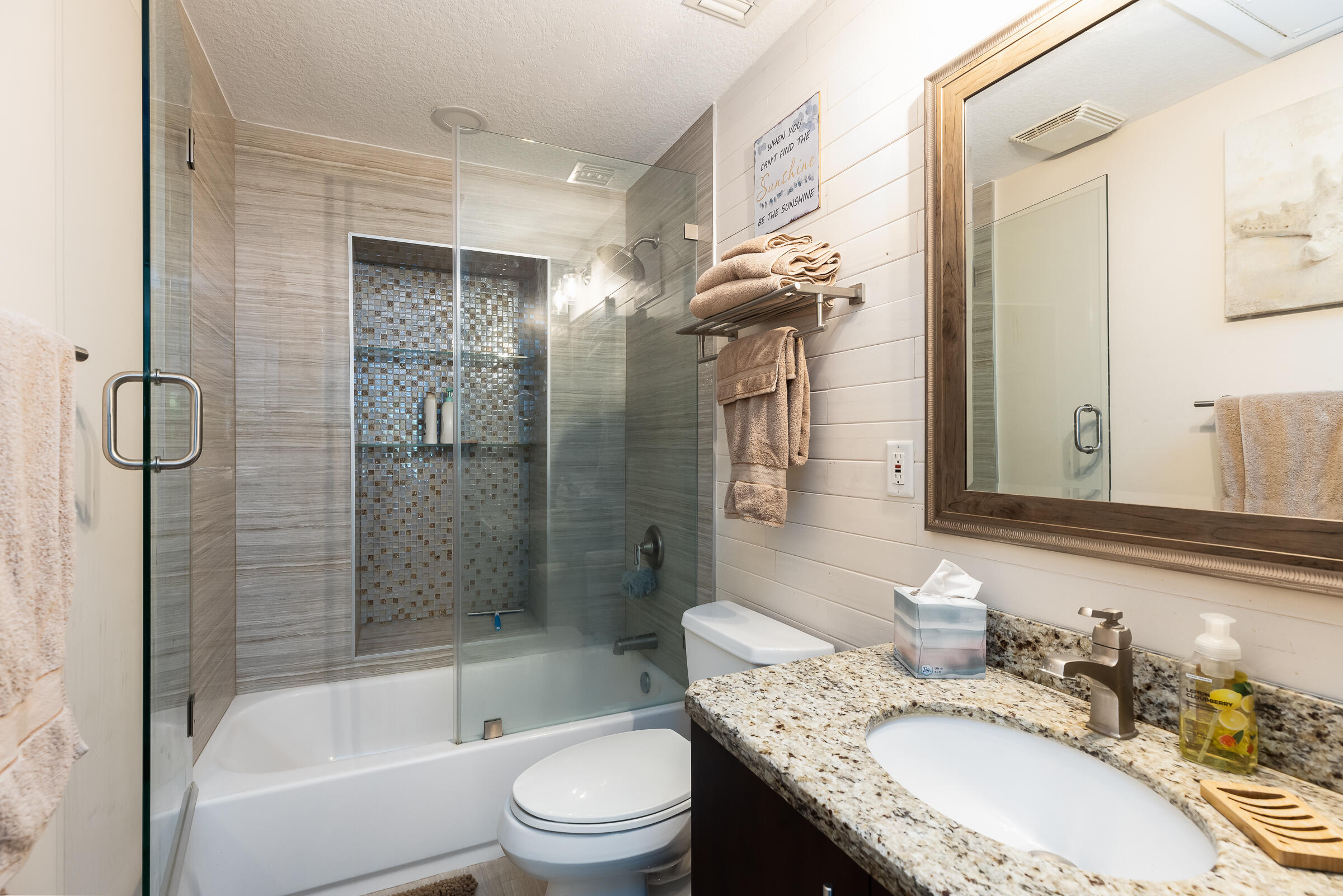 98222 Windward Avenue Key Largo, FL 33037 - Photo 22 of 41 a bathroom with a granite countertop tub sink toilet and shower
