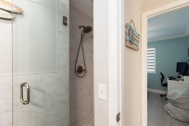 a balcony with furniture and a window