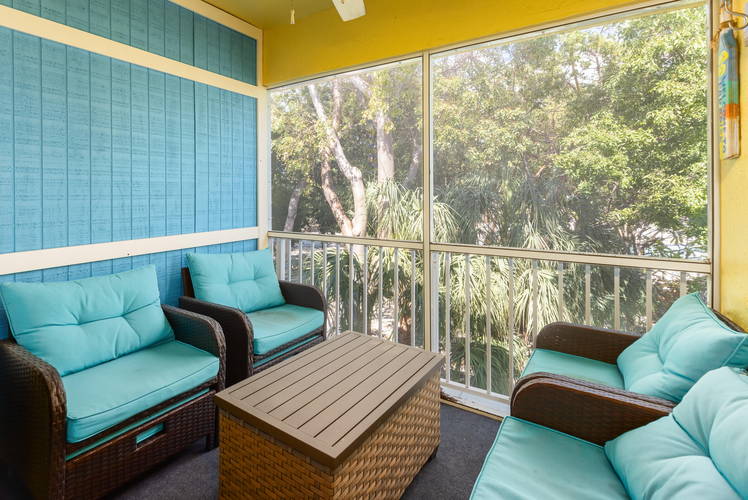 98222 Windward Avenue Key Largo, FL 33037 - Photo 29 of 41 a balcony with furniture and a window