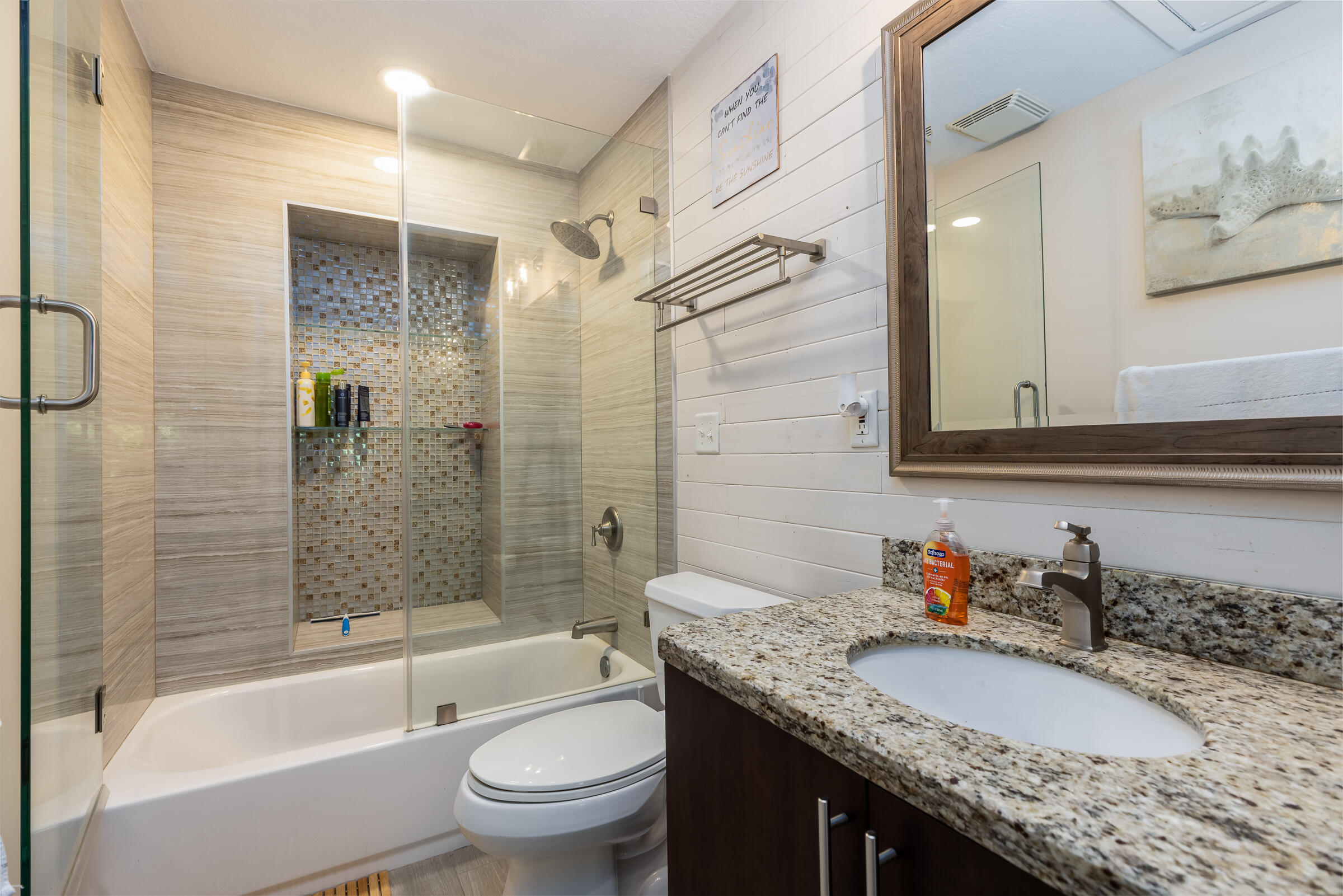98222 Windward Avenue Key Largo, FL 33037 - Photo 30 of 41 a bathroom with a granite countertop sink toilet and shower