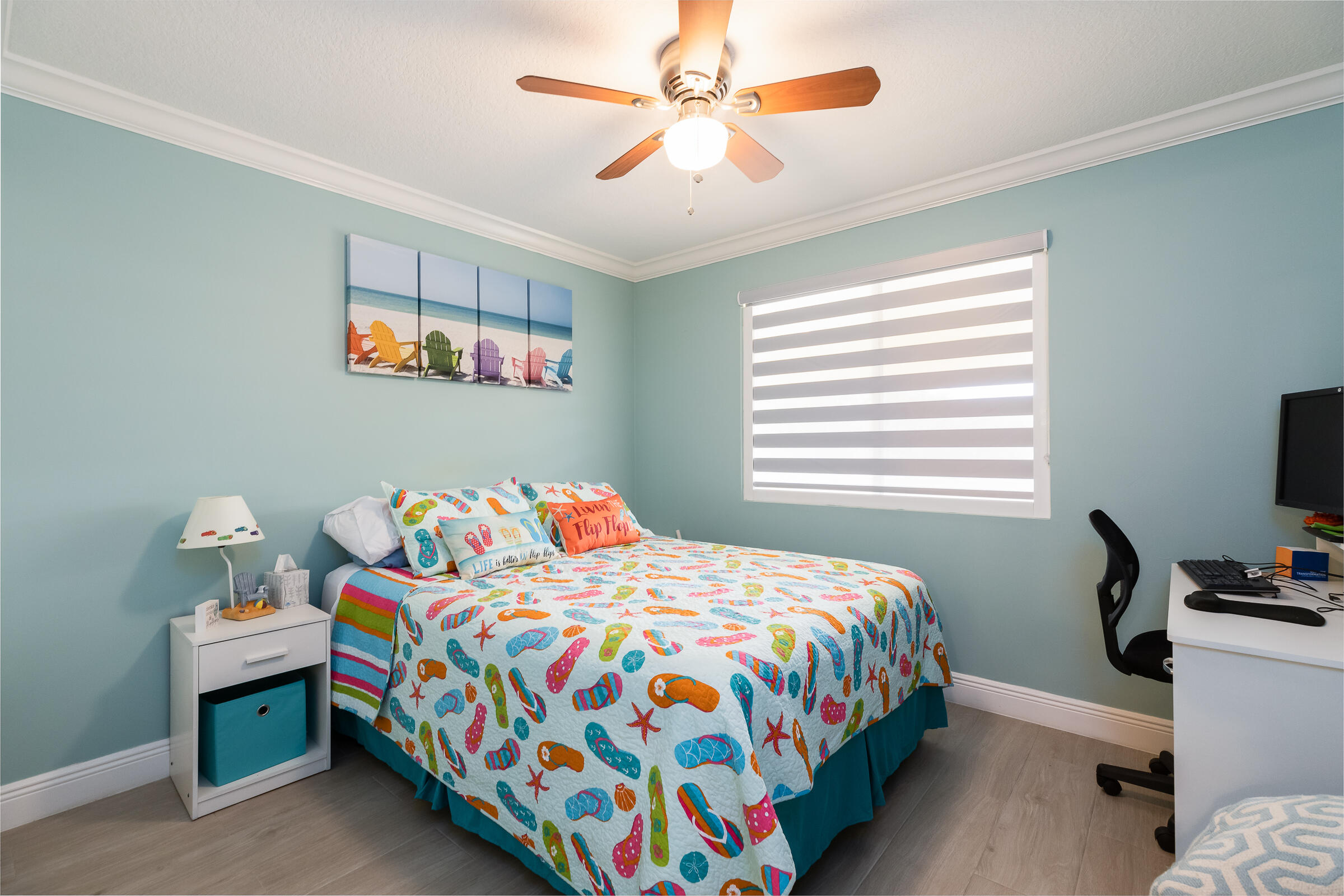 98222 Windward Avenue Key Largo, FL 33037 - Photo 34 of 41 a bedroom with a bed and a tv