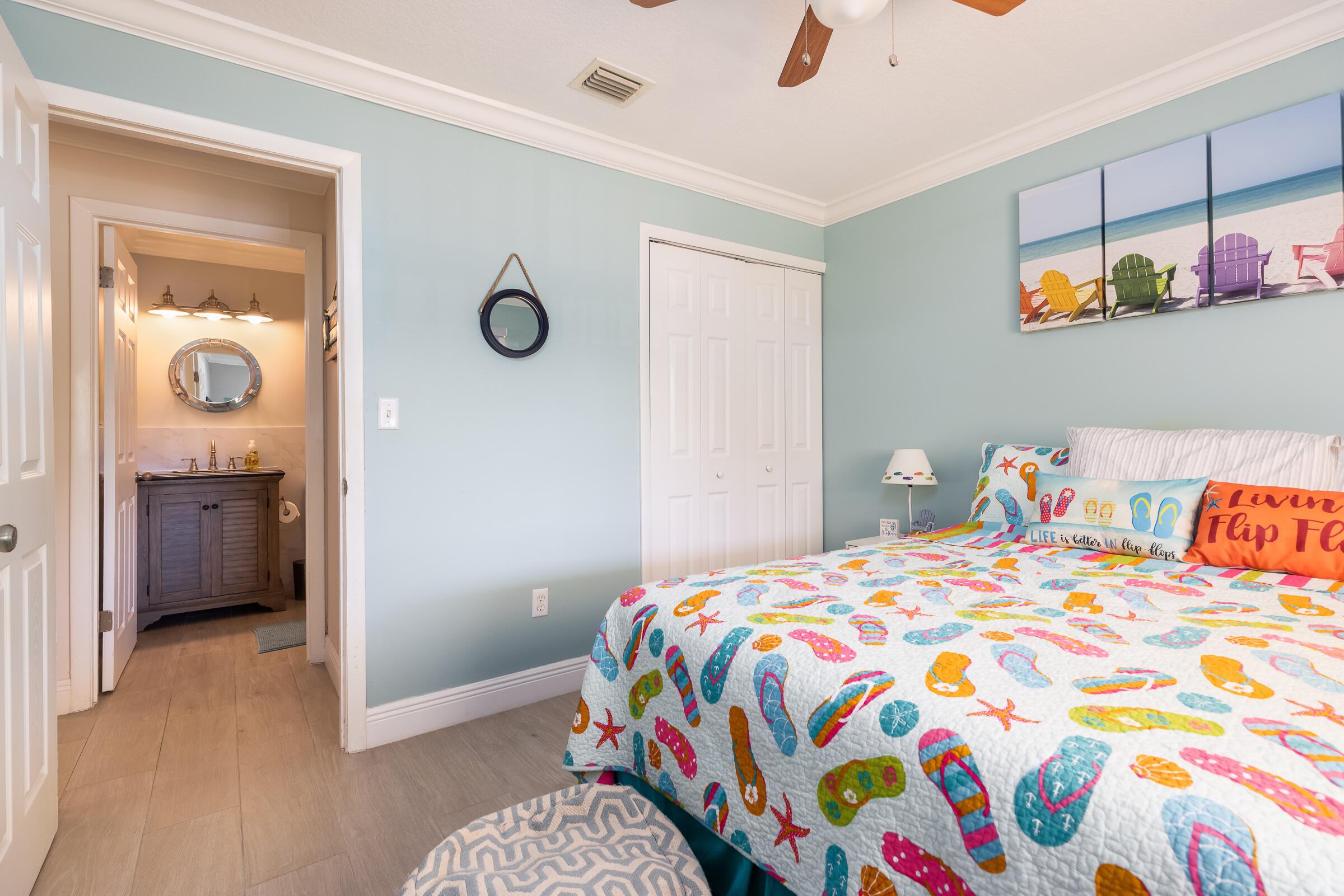 98222 Windward Avenue Key Largo, FL 33037 - Photo 35 of 41 a bedroom with a bed and a dresser