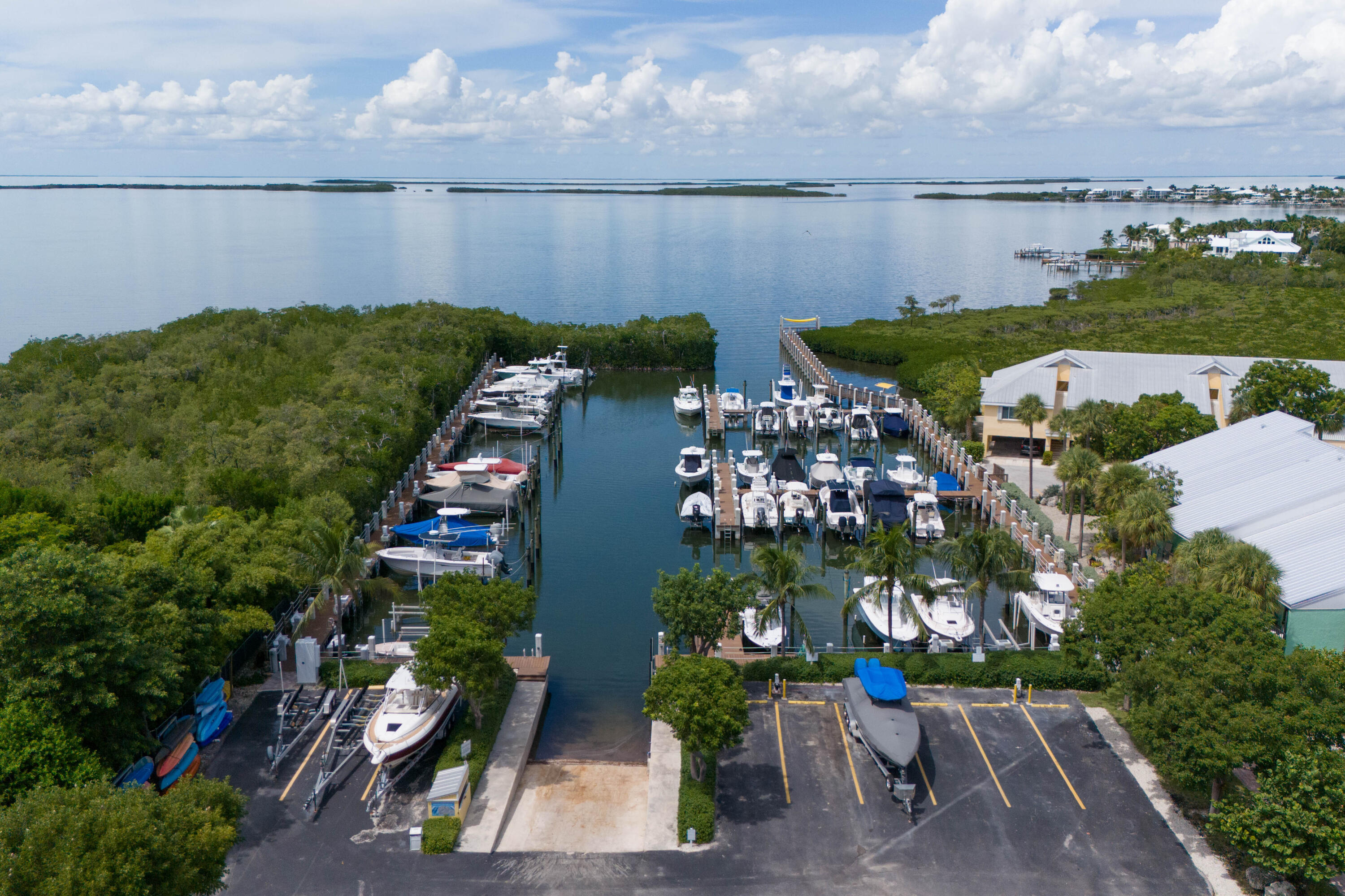 98222 Windward Avenue Key Largo, FL 33037 - Photo 40 of 41 an aerial view of a house with a lake view
