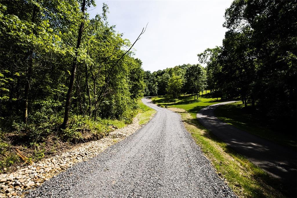 0 Stuckey Renfrew, PA 16053 - Photo 2 of 7 a view of a swimming pool with a yard