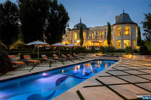 a view of swimming pool with outdoor seating