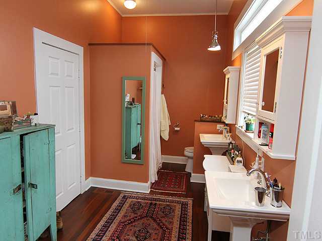 3511 Carpenter Pond Road Durham, NC 27703 - Photo 12 of 25 Wonderful Remodeled Master Bath. His & Her Fabulous Sinks- Hardwood Floors -Shower - Natural Light Streams Thru Private Window