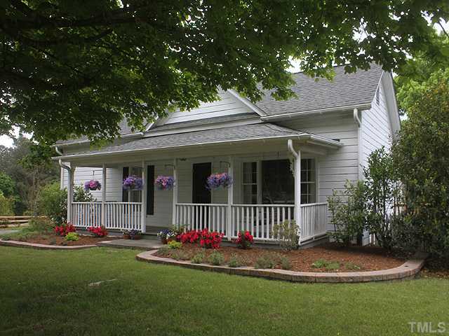 3511 Carpenter Pond Road Durham, NC 27703 - Photo 3 of 25 Enjoy the Swing and Put Some Rocking Chairs for an Enjoyable Time.