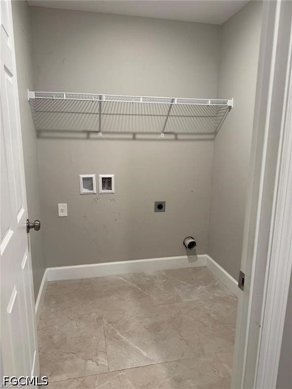 2134 Davis Street Fort Myers, FL 33916 - Photo 3 of 6 a view of a room with racks on the wall