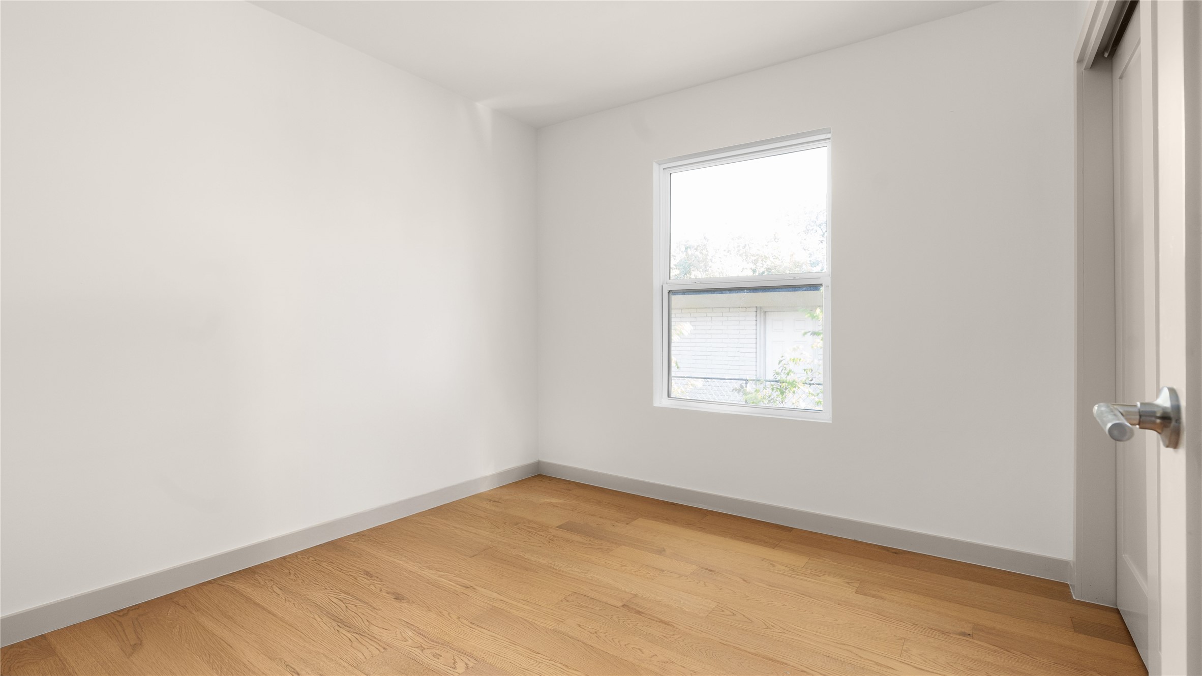 5504 Mapleleaf Drive Austin, TX 78723 - Photo 19 of 23 an empty room with a window