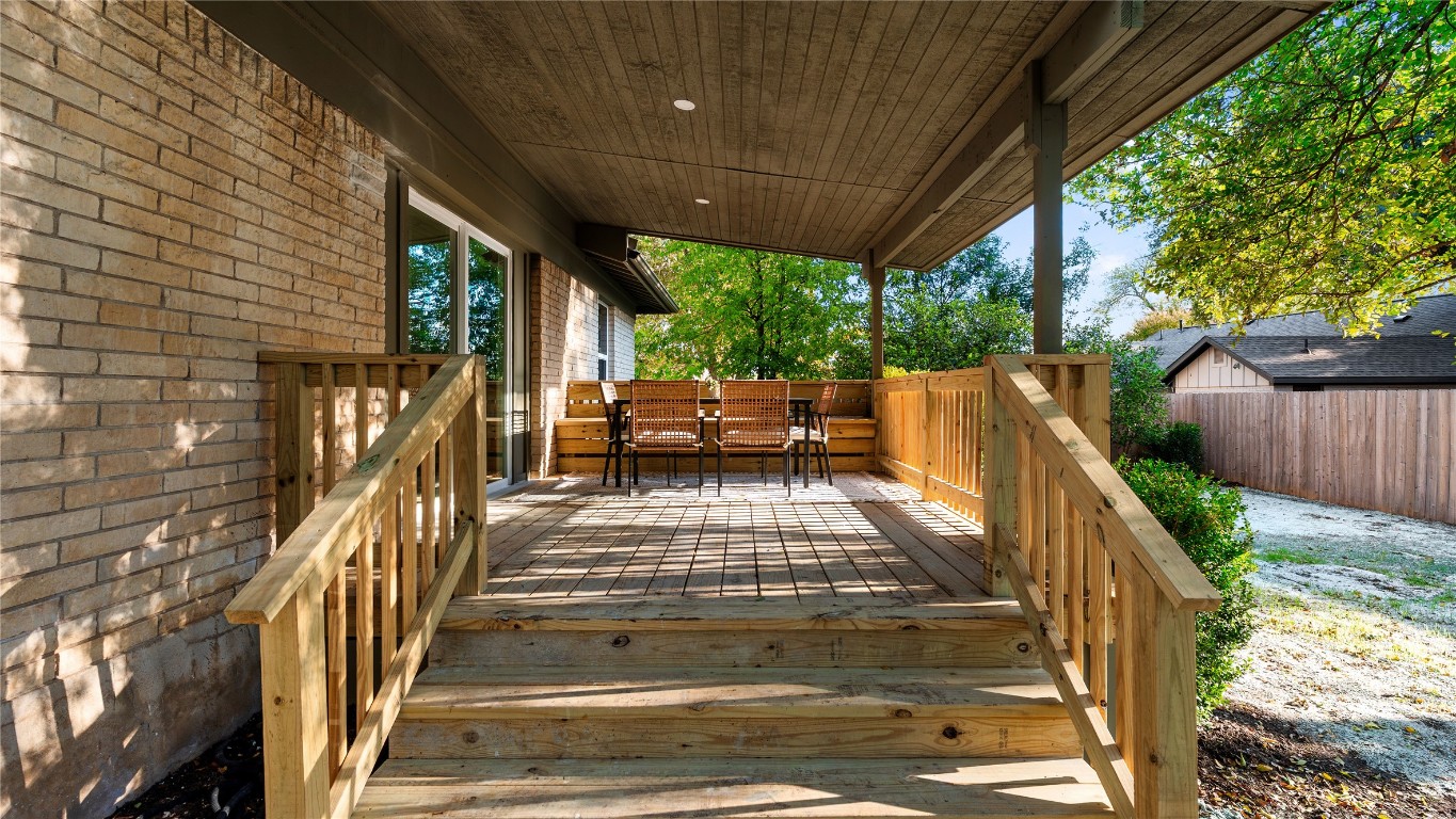 5504 Mapleleaf Drive Austin, TX 78723 - Photo 23 of 23 Covered wood deck with bench