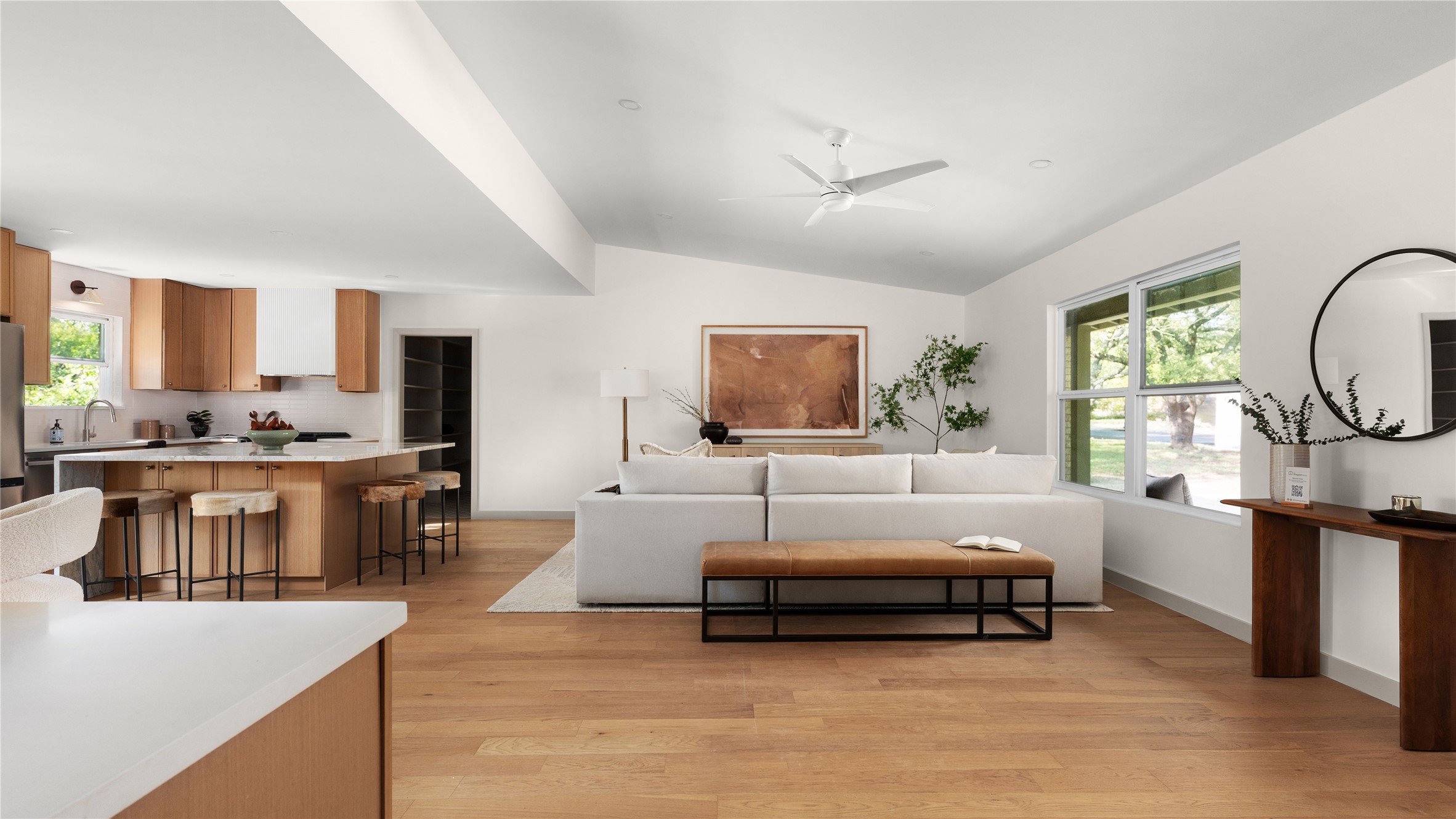 5504 Mapleleaf Drive Austin, TX 78723 - Photo 10 of 23 a living room with furniture and a flat screen tv