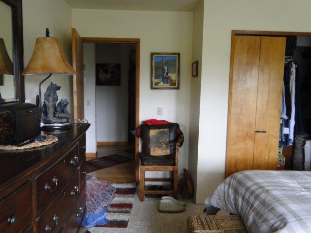 2000 Limpy Creek Road Grants Pass, OR 97527 - Photo 17 of 35 a bedroom with a bed and a mirror