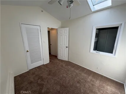 a view of empty room with windows