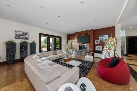 a large kitchen with a table and chairs