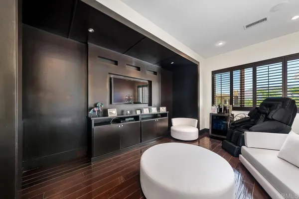 a bed room with a bed window and a table