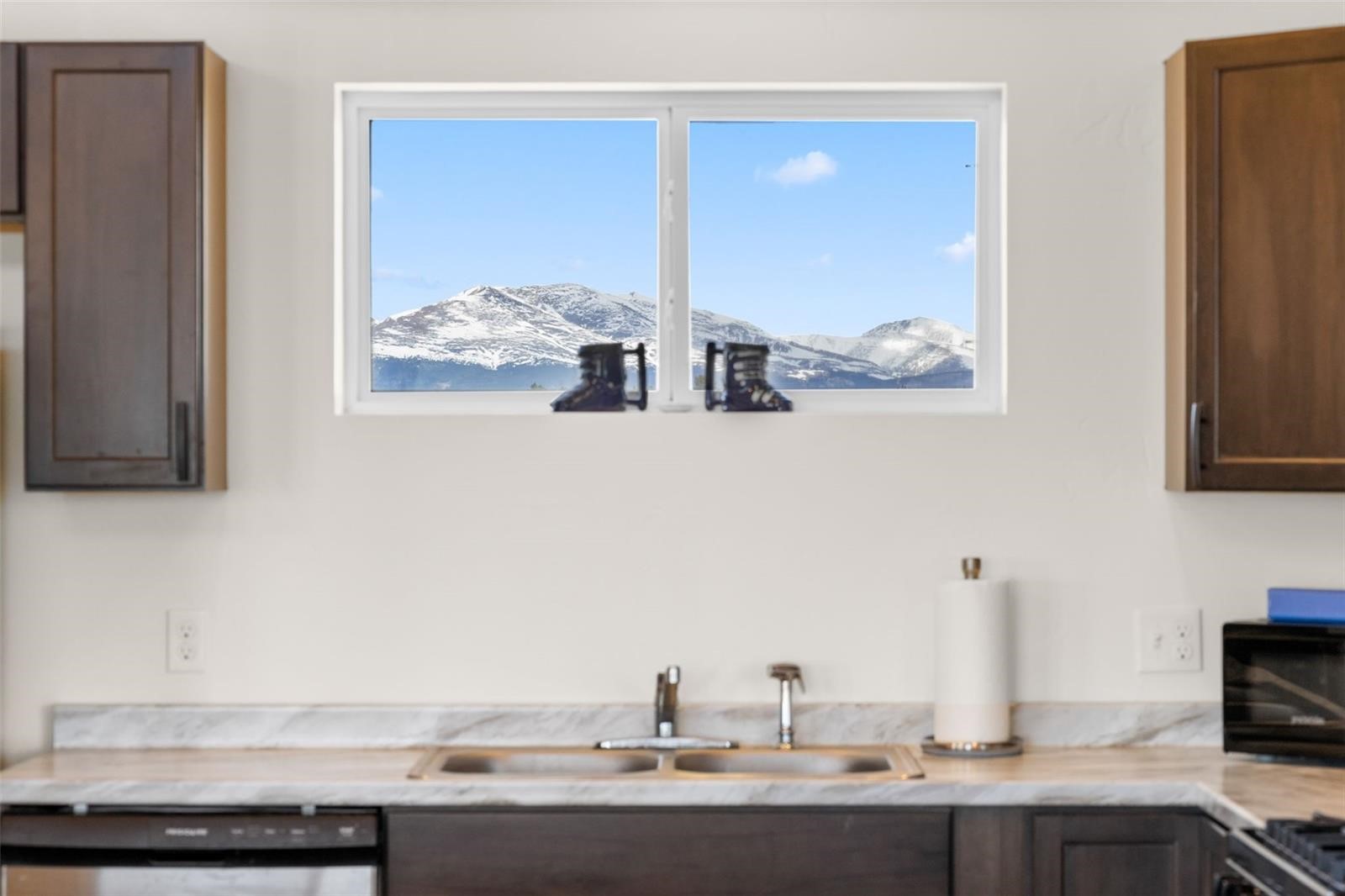 431 Rudisill Street Fairplay, CO 80440 - Photo 11 of 45 a bathroom with a granite countertop sink and two large mirror
