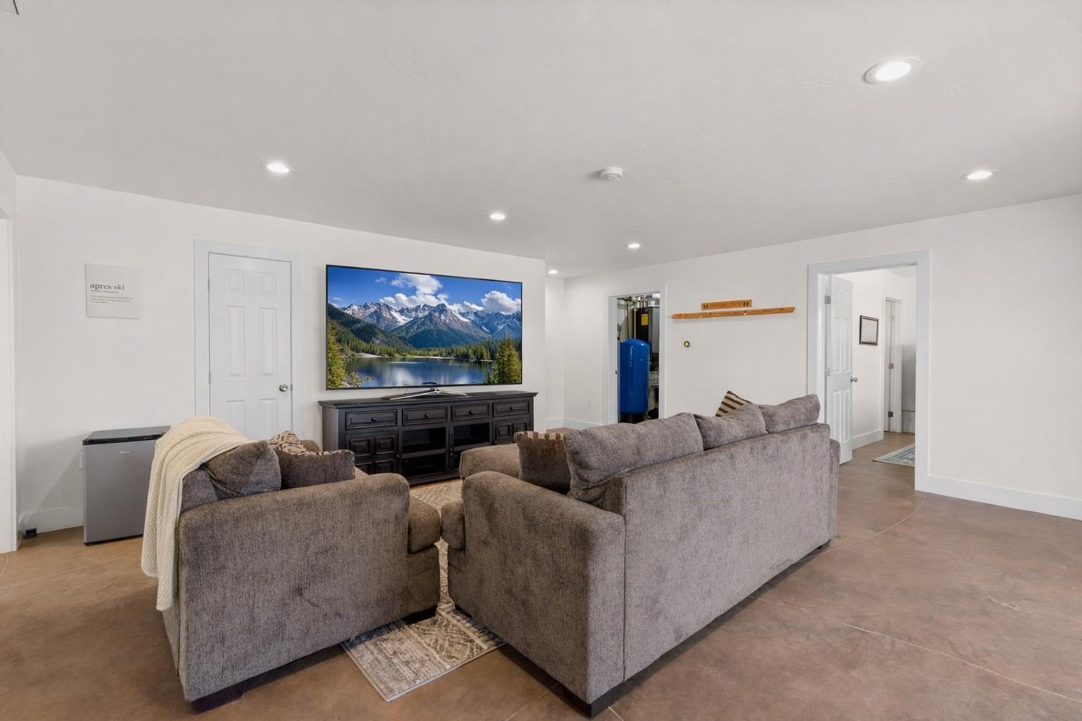 431 Rudisill Street Fairplay, CO 80440 - Photo 33 of 45 a living room with furniture and a flat screen tv