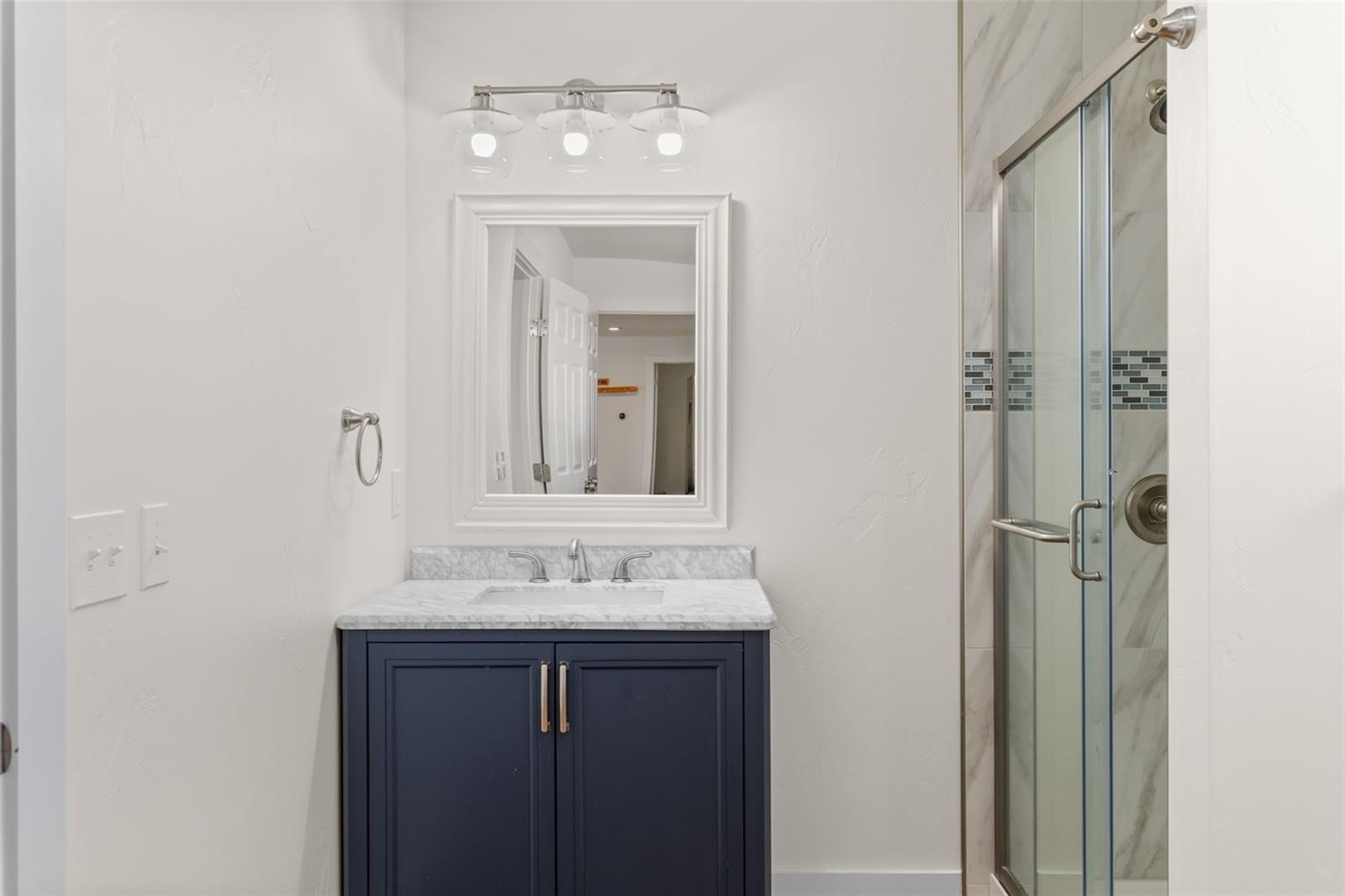 431 Rudisill Street Fairplay, CO 80440 - Photo 39 of 45 a bathroom with a sink and a mirror