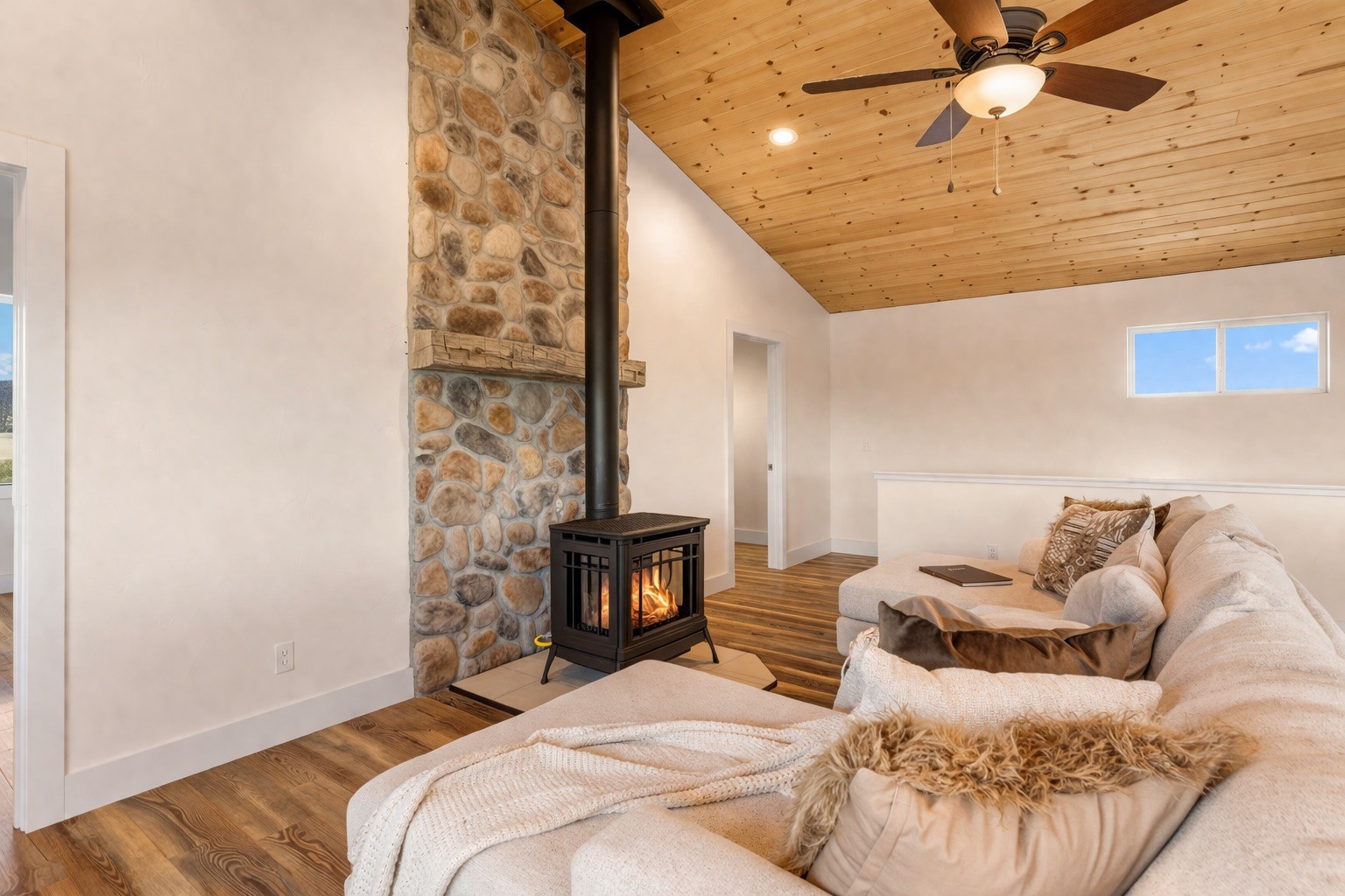431 Rudisill Street Fairplay, CO 80440 - Photo 5 of 45 a bedroom with a bed and a fireplace