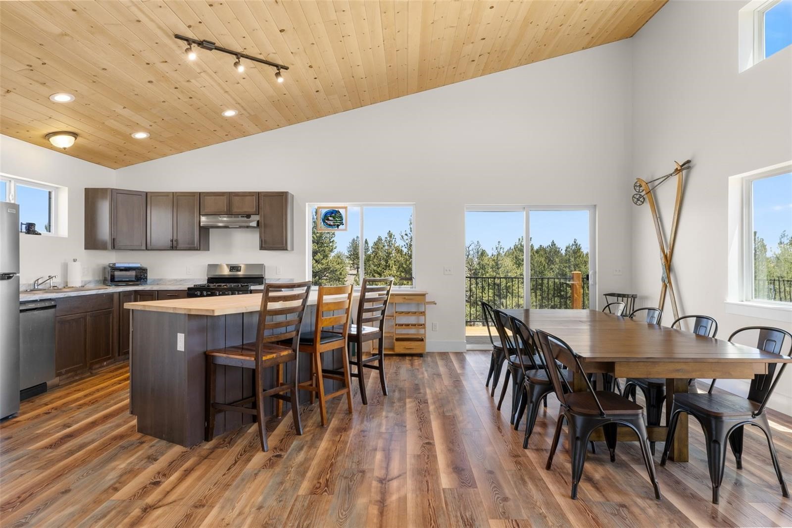 431 Rudisill Street Fairplay, CO 80440 - Photo 9 of 45 a view of a dining room with furniture window and wooden floor