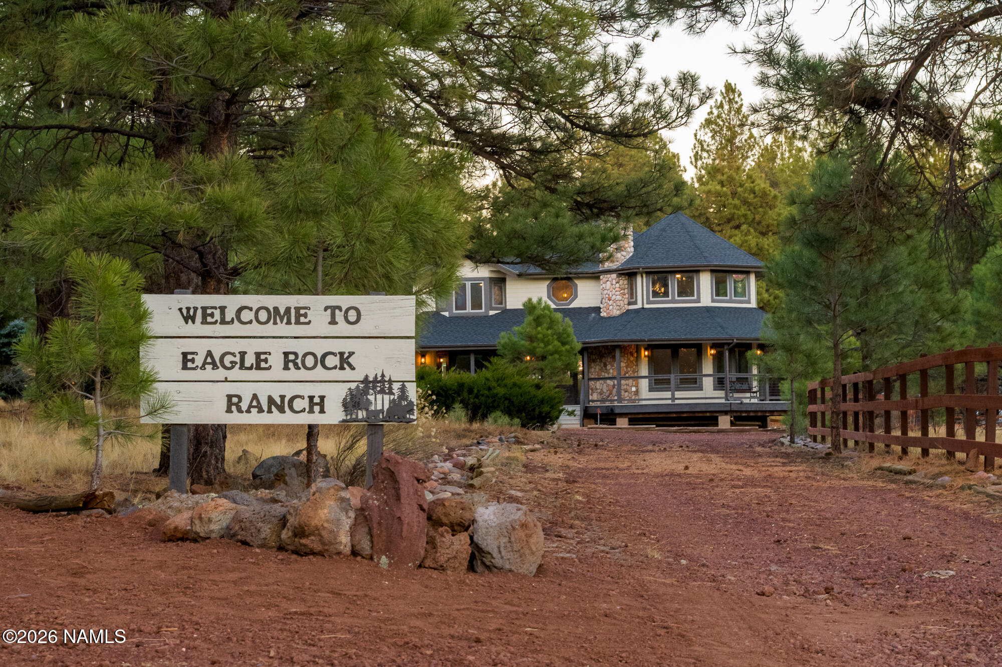 4540 Forest Ranches Loop Parks, AZ 86018 - Photo 2 of 60 a sign on the side of a road