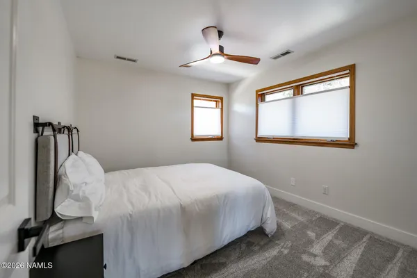 a view of a large window with wooden floor in front of house