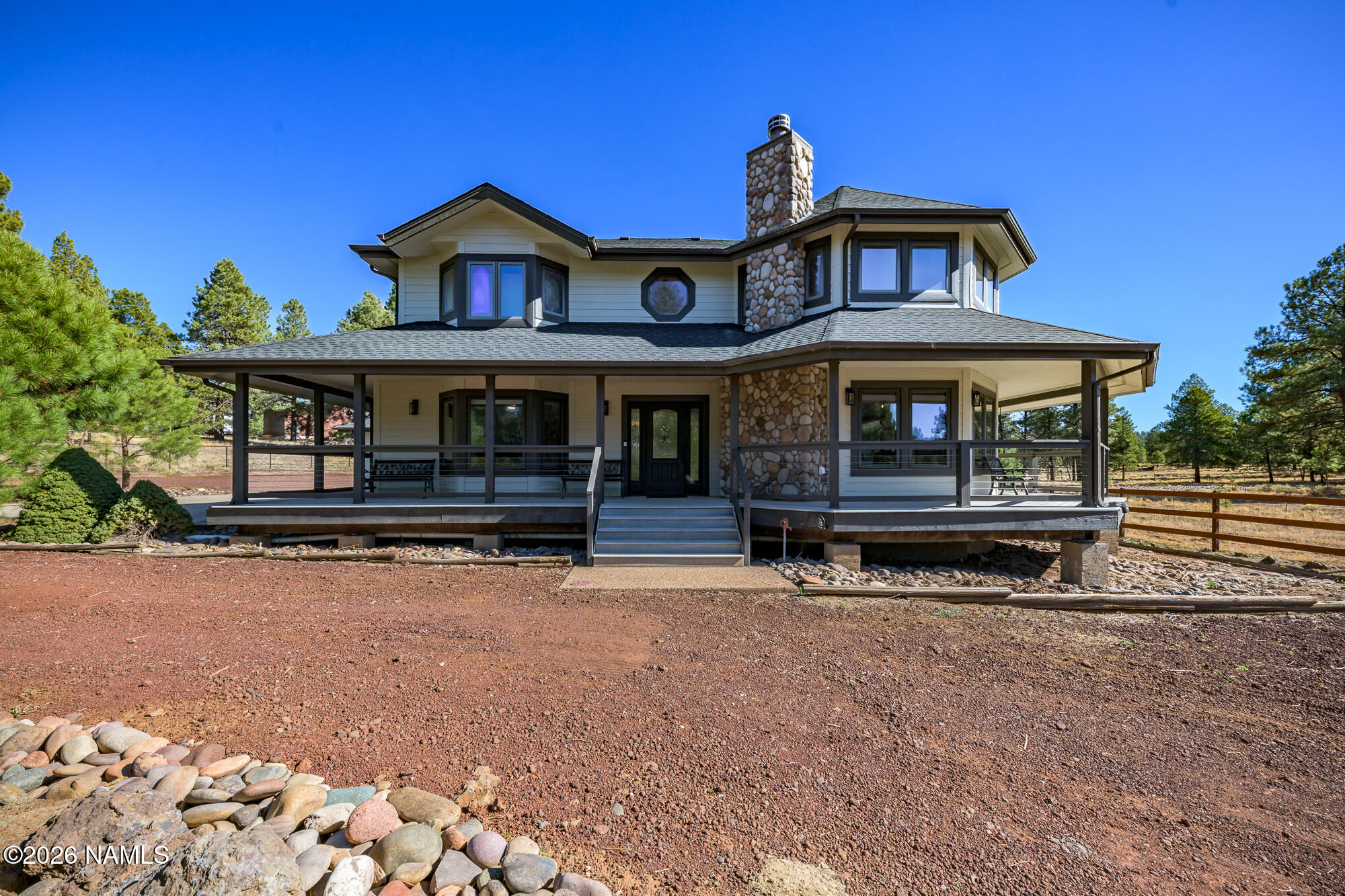 4540 Forest Ranches Loop Parks, AZ 86018 - Photo 35 of 60 a house view with a outdoor space
