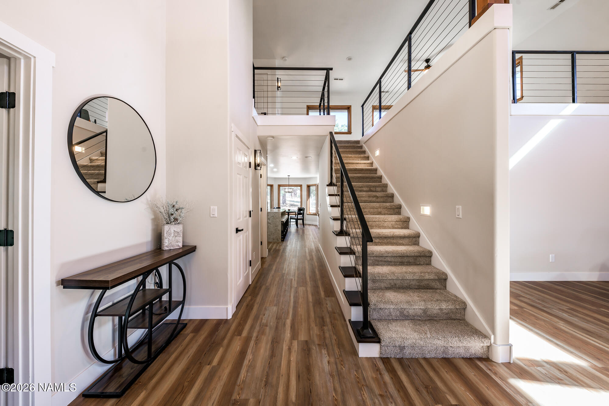 4540 Forest Ranches Loop Parks, AZ 86018 - Photo 4 of 60 a view of entryway with wooden floor and a front door