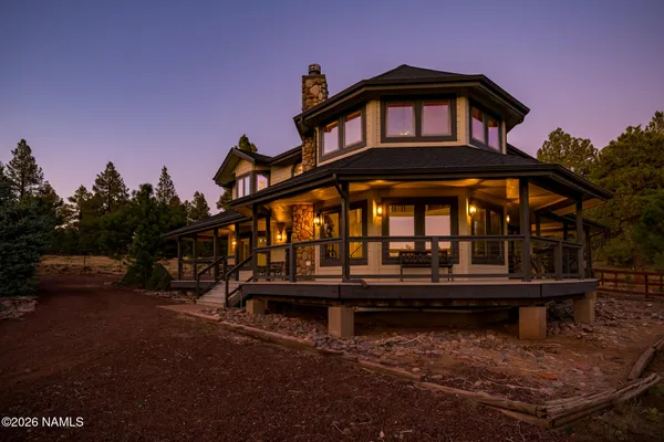 a view of a town with mountains in the background