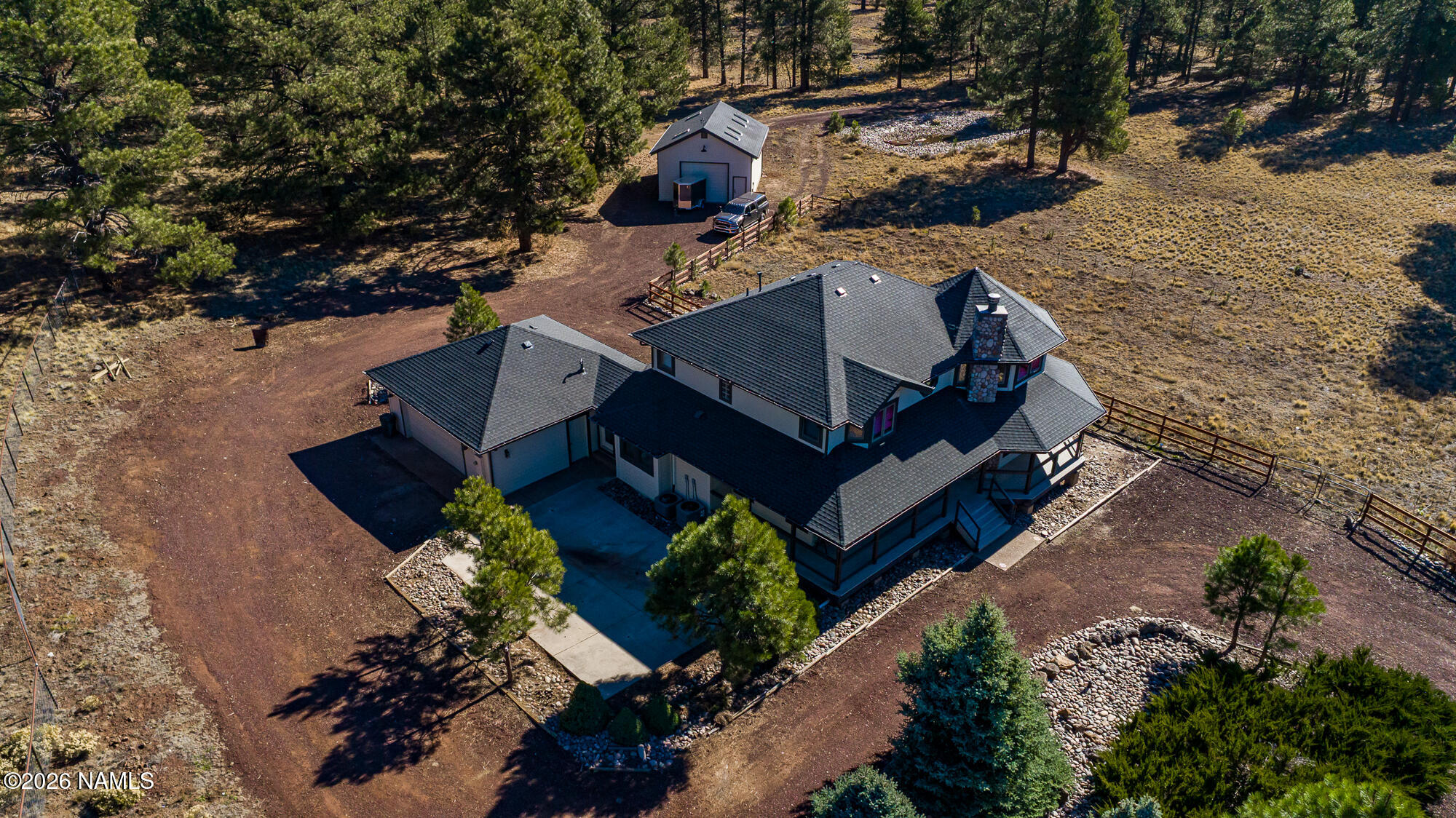 4540 Forest Ranches Loop Parks, AZ 86018 - Photo 52 of 60 an aerial view of a house with a yard