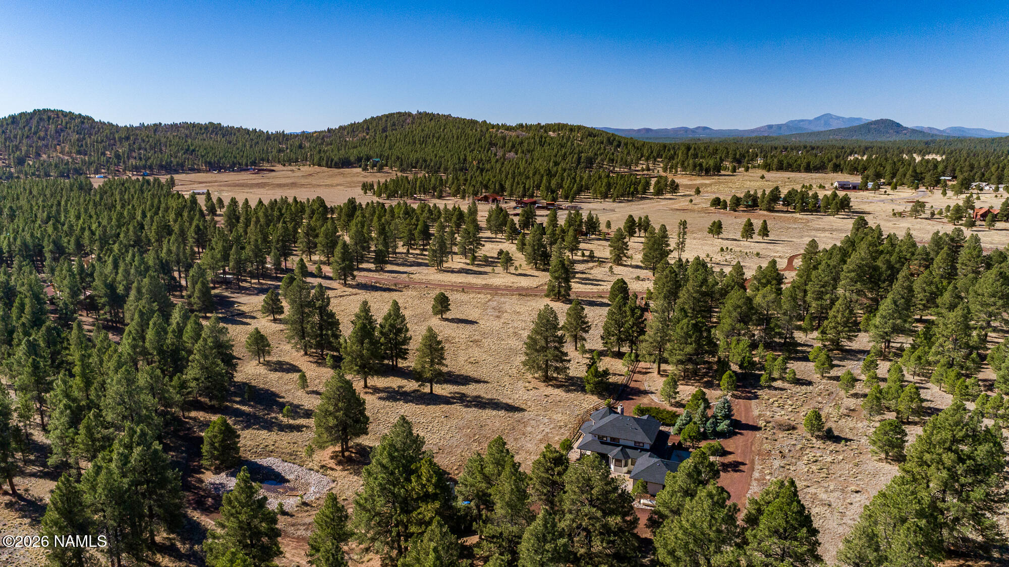 4540 Forest Ranches Loop Parks, AZ 86018 - Photo 56 of 60 a view of lake with mountain
