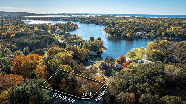 $449,000 | 2215 North Holiday Drive, Mears, MI 49436