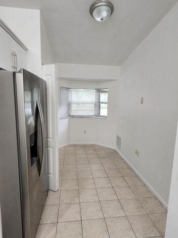 3810 North Jog Road, Unit 202 West Palm Beach, FL 33411 - Photo 12 of 23 EAT IN KITCHEN WITH BAY WINDOW