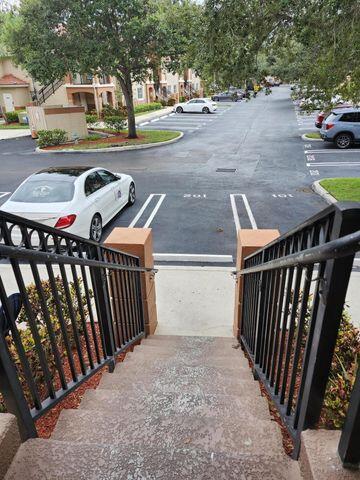 3810 North Jog Road, Unit 202 West Palm Beach, FL 33411 - Photo 5 of 23 EXTERNAL ENTRANCE TO THE UNIT