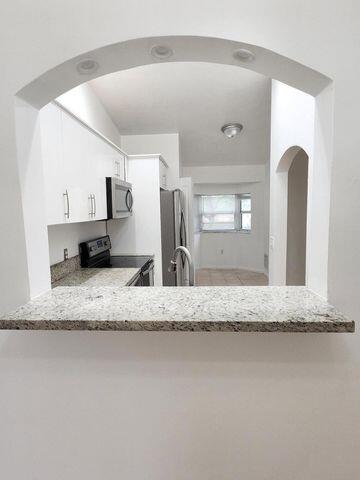 3810 North Jog Road, Unit 202 West Palm Beach, FL 33411 - Photo 8 of 23 PASSTHROUGH WINDOW TO DR