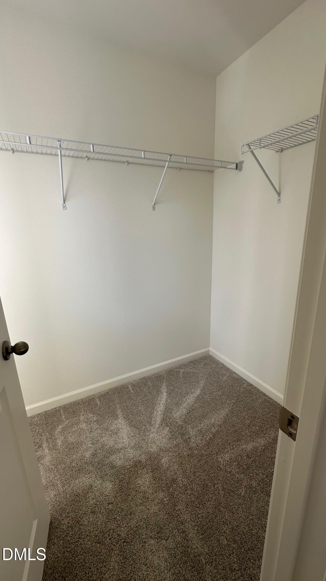 10610 Brookside Reserve Road Raleigh, NC 27614 - Photo 24 of 27 a view of an empty walk in closet