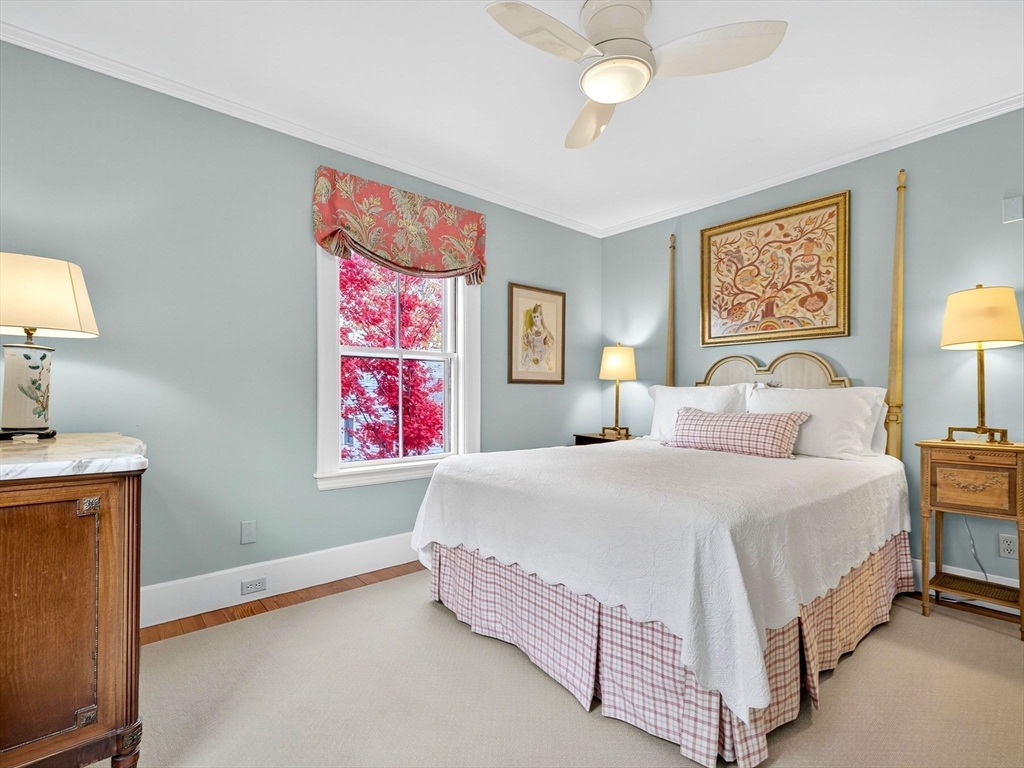 32 Donizetti Street Wellesley, MA 02482 - Photo 13 of 22 a bedroom with a bed and a painting on the wall
