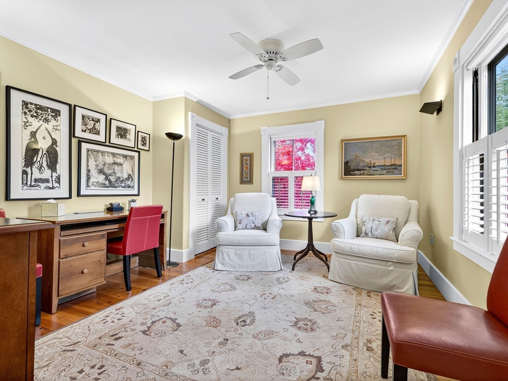 32 Donizetti Street Wellesley, MA 02482 - Photo 16 of 22 a living room with furniture and paintings on the wall
