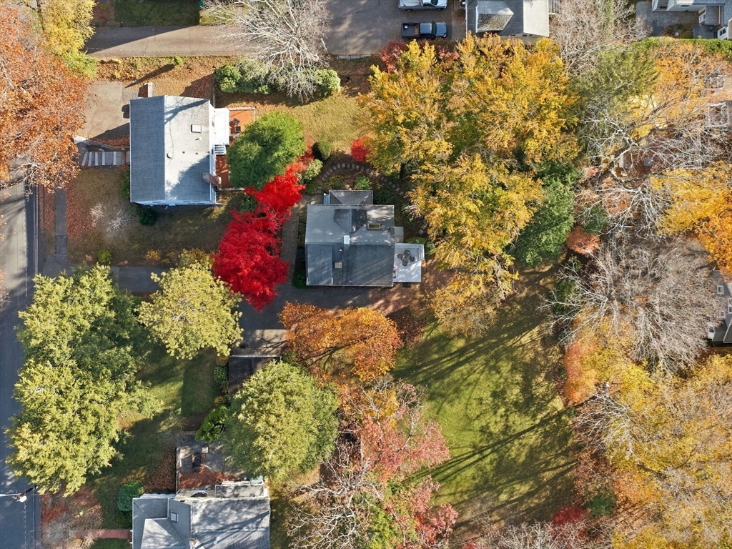 32 Donizetti Street Wellesley, MA 02482 - Photo 21 of 22 a front view of a house with a yard