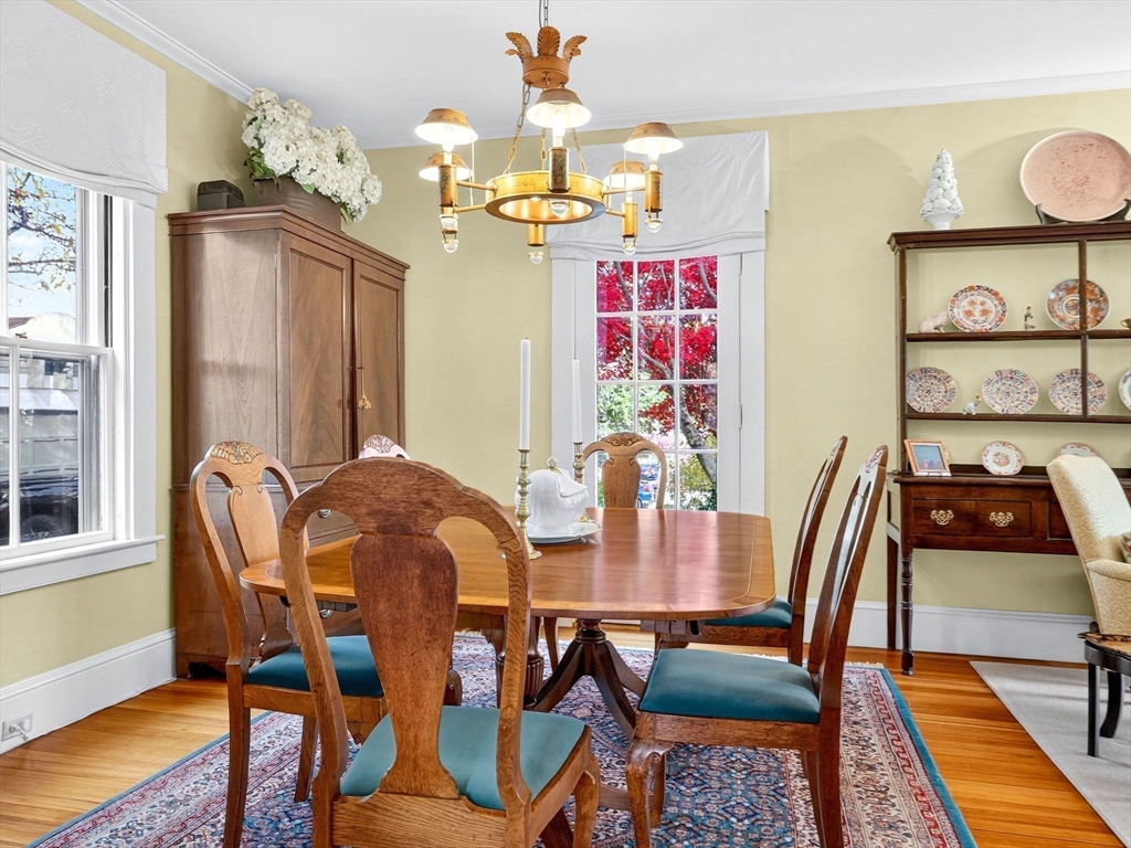 32 Donizetti Street Wellesley, MA 02482 - Photo 8 of 22 a view of a dining room with furniture and chandelier