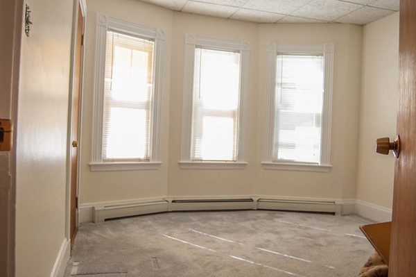 8-10 Kimball Road Watertown, MA 02472 - Photo 19 of 20 a view of an empty room with a window